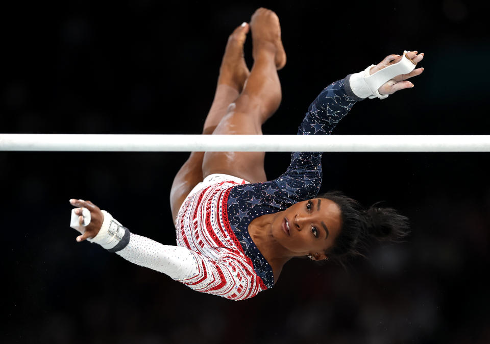 PARIS, FRANCE - JULY 30: Simone Biles of Team USA competes on the uneven bars during the women's gymnastics team final on day four of the Paris 2024 Olympic Games at the Bercy Arena on July 30, 2024 in Paris, France. (Photo by Jamie Squire/Getty Images)