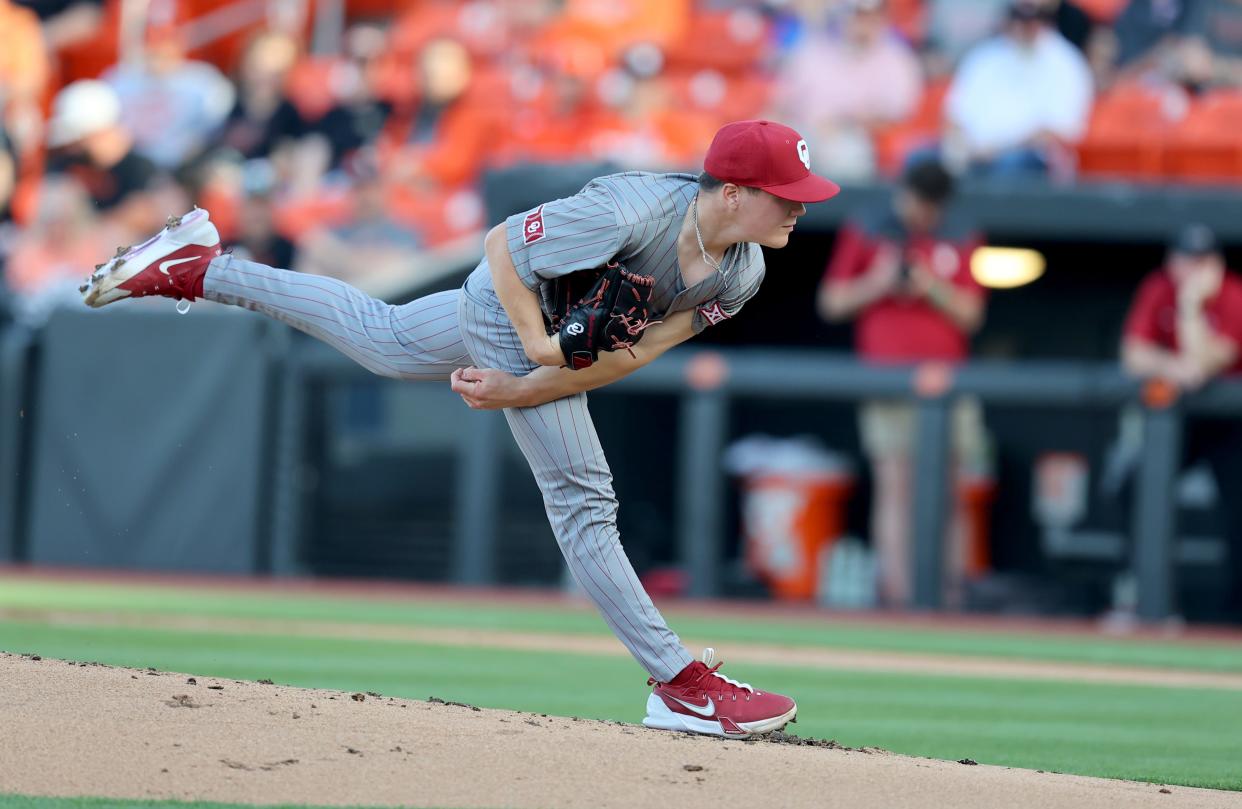 Braden Davis (13) throws a pitch during the college Bedlam baseball game between Oklahoma State University Cowboys and the University of Oklahoma Sooners at O'Brate Stadium in Stillwater, Okla., Friday, April 5, 2024.