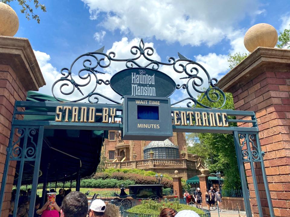 A wait-time sign at the entrance to the Haunted Mansion at Magic Kingdom in August 2021.