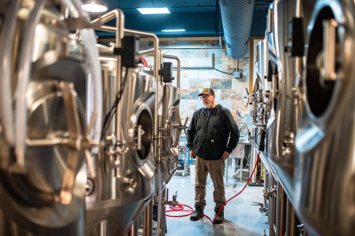 Salt Road Brewing owner-operator Scott Ficarra gives a tour of the new downtown brewery on Wednesday in Fort Collins. The town's newest beermaker opens Saturday, April 22, at 321 Old Firehouse Alley, the former site of Prost.