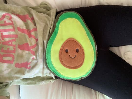 An avocado heating pad that you can also toss in the freezer and use as a cooling pad