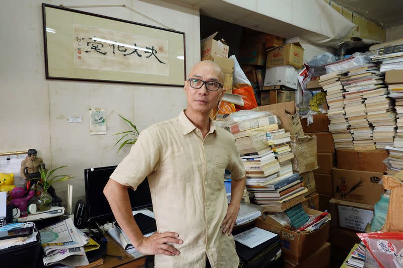 Jimmy Pang, president of Sub-Culture Limited publishing house, poses during an interview with Reuters at his office in Hong Kon