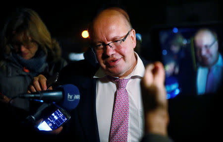 Peter Altmaier of the Christian Democratic Union (CDU) leaves the German Parliamentary Society after exploratory talks about forming a new coalition government in Berlin, Germany, November 17, 2017. REUTERS/Hannibal Hanschke