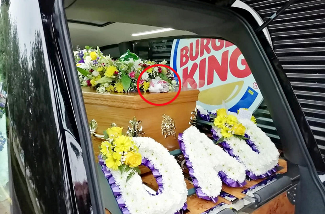 A hearse has been spotted going through a Burger King drive-thru in order to fulfil a great-granddad's dying wish - for one final double bacon cheeseburger.  See SWNS story SWLEfuneral.  Leonard Durkin's funeral cortege pulled into the fast food joint and stunned diners watched on as the vehicle containing his casket placed an order at the window.   After the dapper driver paid £4.49 for the snack he got out the car, opened the boot and placed it on top of Leonard's coffin.   His son, Peter, 50, said the two of them would visit Burger King once a week after going to his mum's grave in Leeds, West Yorks, and that his dad had requested the unusual tribute before his death on May 28.   At the end of the ceremony at a nearby crematorium, as the coffin was taken away to be burned, the Johnny Cash classic 'Ring of Fire' rang out over the sound system. 