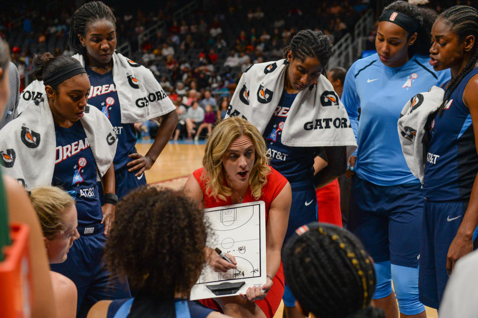 Atlanta head coach Nicki Collen (center) draws up a play during a time-out during the WNBA game between the Los Angeles Sparks and the Atlanta Dream on July 23rd, 2019 at State Farm Arena in Atlanta, GA. (Photo by Rich von Biberstein/Icon Sportswire via Getty Images)