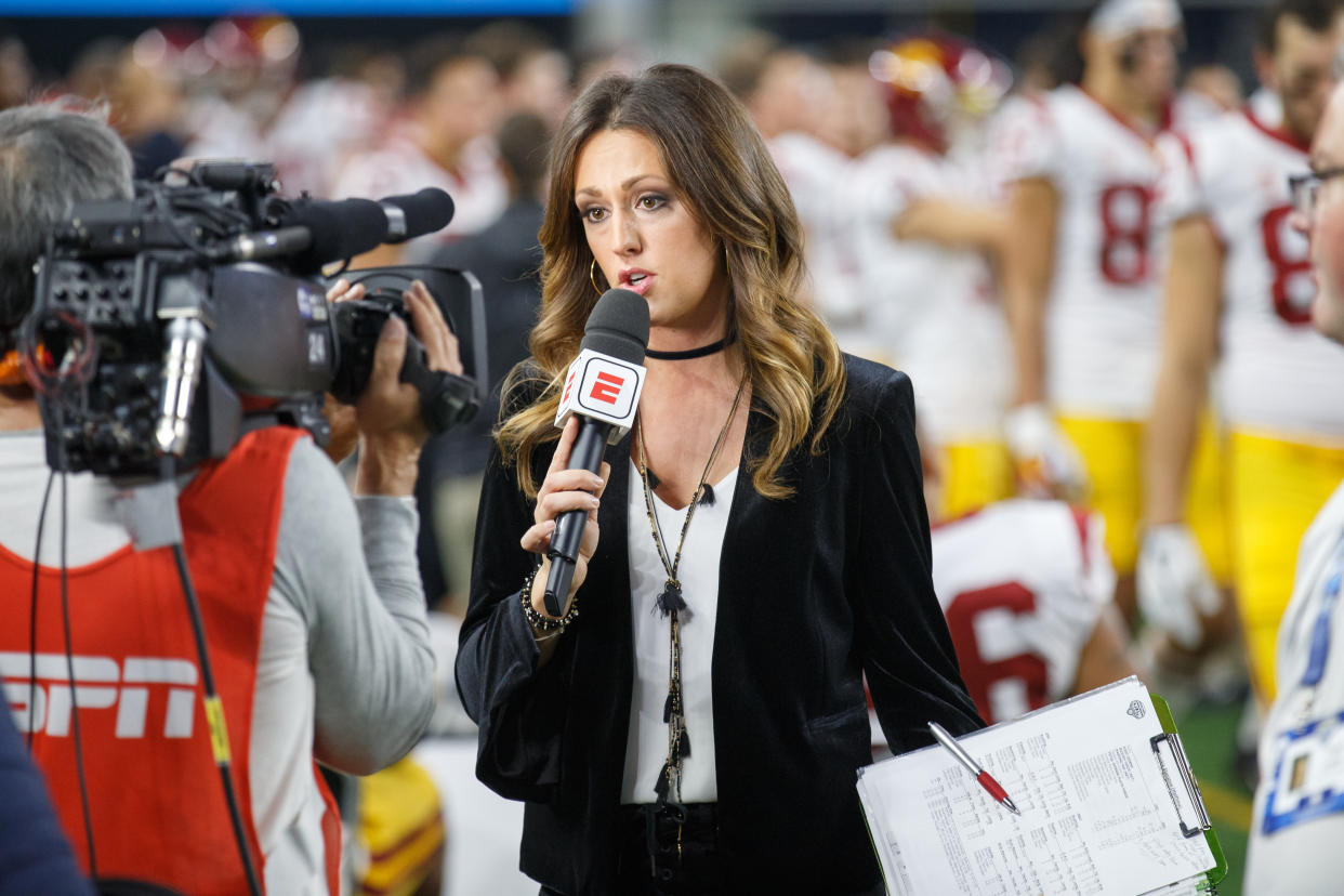 ARLINGTON, TX - DECEMBER 29: ESPN sideline reporter Allison Williams talk to the camera on the sideline during the Cotton Bowl Classic matchup between the USC Trojans and Ohio State Buckeyes on December 29, 2017, at the AT&T Stadium in Arlington, TX.  Ohio State won the game 24-7.  (Photo by Matthew Visinsky/Icon Sportswire via Getty Images)
