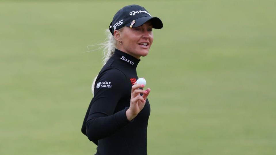 English golfer Charley Hull reacts after making a birdie on her final hole in round one of the Women's Open 2024