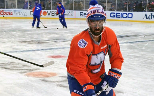 Cal Clutterbuck has a black face during Islanders Yankee Stadium skate  (Photo)