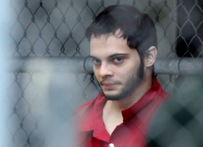 FILE PHOTO:     Esteban Santiago is taken from the Broward County main jail as he is transported to the federal courthouse in Fort Lauderdale, Florida, U.S. on January 9, 2017. Courtesy Amy Beth Bennett/South Florida Sun Sentinel via REUTERS