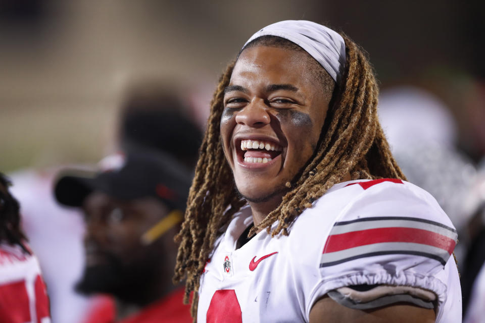 FILE - In this Oct. 18, 2019, file photo, Ohio State defensive end Chase Young laughs on the sidelines during the second half of an NCAA college football game against Northwestern, in Evanston, Ill. Young was selected to The Associated Press All-Am erica team, Monday, Dec. 16, 2019. (AP Photo/Charles Rex Arbogast, File)