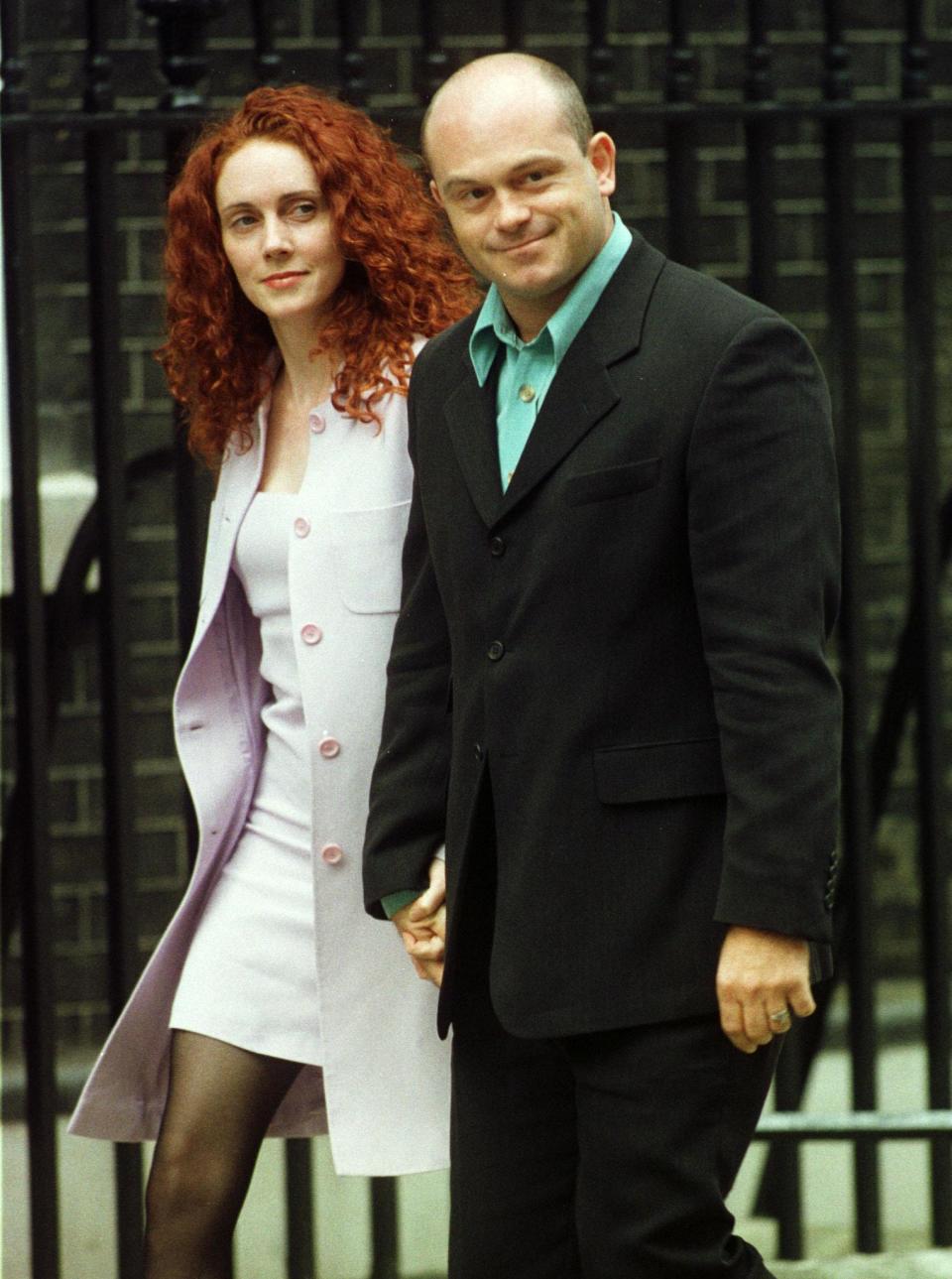 Former Eastender's star Ross Kemp arrives with an unidentified friend for a party at 10 Downing Street July 30. Prime Minister Tony Blair invited people from the show business and the media for an informal party. BRITAIN