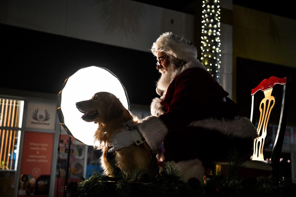 Reports are coming in from around the world of people testing positive for COVID-19 after spending time with Santa. (Chandan Khanna/AFP)