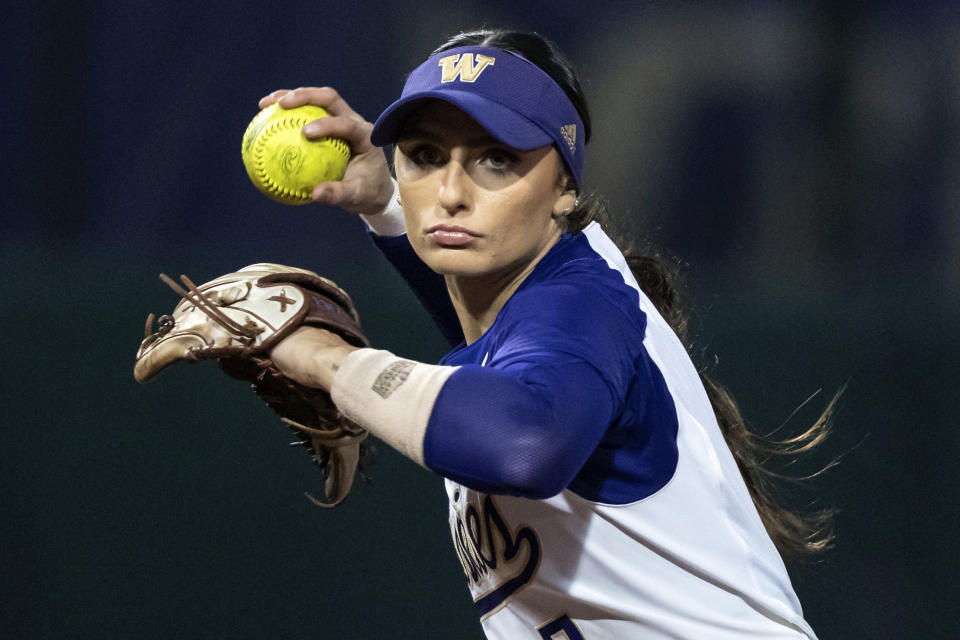 ILE - Washington third baseman Baylee Klingler looks to throw during an NCAA college softball game against Robert Morris, March 8, 2022, in Seattle. Klingler was chosen by the Texas Smoke at No. 2 overall in the Women's Professional Fastpitch (WPF) softball draft. (AP Photo/Stephen Brashear, File)