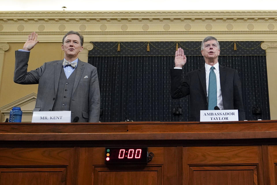 State Department official George Kent (left) and top U.S. diplomat in Ukraine William Taylor are sworn in prior to testifying before the House Intelligence Committee on Nov. 13, 2019. (Photo: Joshua Roberts / Getty Images)