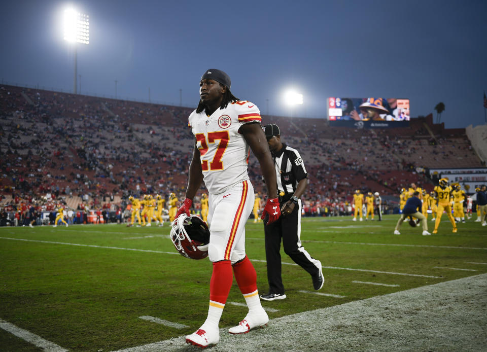 FILE - In this Nov. 19, 2018, file photo, Kansas City Chiefs running back Kareem Hunt walks off the field prior to an NFL football game against the Los Angeles Rams, in Los Angeles. The NFL has suspended Browns running back Kareem Hunt for eight games after a video showed him kicking a woman and he was later involved in a fight at a resort. The league on Friday, March 15, 2019, cited a violation of its personal conduct policy "for physical altercations at his residence in Cleveland last February and at a resort in Ohio last June." Hunt will not be paid during the half-season suspension, which he will not appeal. (AP Photo/Kelvin Kuo, File)