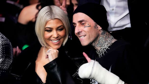 PHOTO: FILE - Kourtney Kardashian and Travis Barker attend the UFC 285 event at T-Mobile Arena, March 04, 2023 in Las Vegas. (Jeff Bottari/Zuffa LLC via Getty Images, FILE)