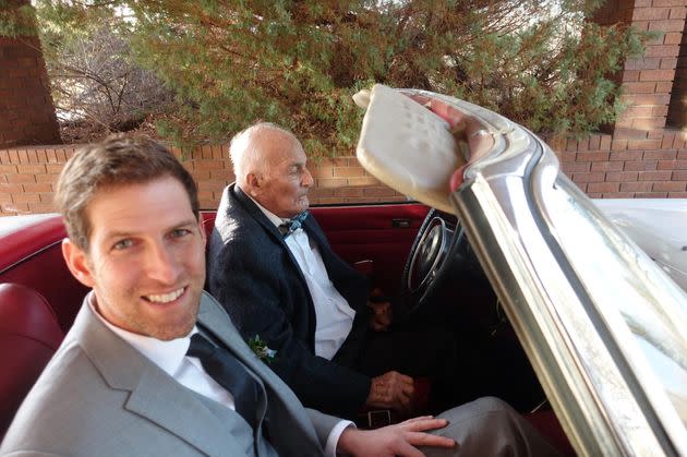 The author, left, is pictured at his wedding, alongside his father, in 2017.