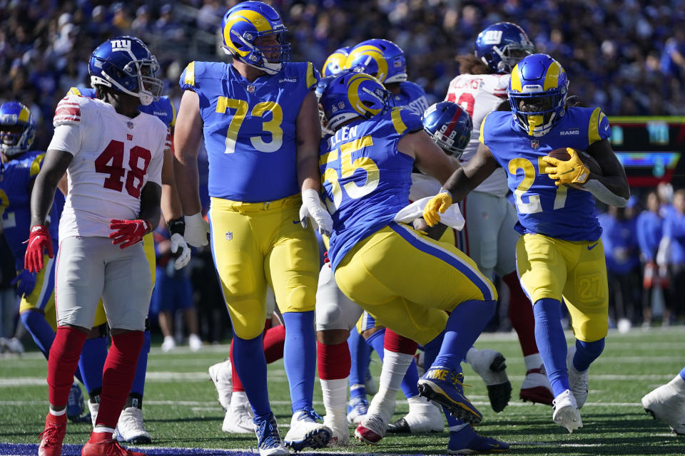 Los Angeles Rams' Darrell Henderson (27), right, tries to run the ball into the end zone during the first half of an NFL football game against the New York Giants, Sunday, Oct. 17, 2021, in East Rutherford, N.J. (AP Photo/Frank Franklin II)