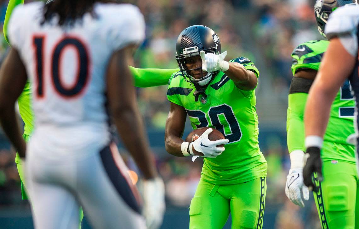 Seattle Seahawks cornerback Michael Jackson (30) celebrates after recovering a fumble by Denver Broncos running back Melvin Gordon III (25) in the third quarter of an NFL game on Monday, Sept. 12, 2022, at Lumen Field in Seattle.