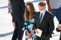 People pay respects as Justice Ruth Bader Ginsburg lies in repose under the Portico at the top of the front steps of the U.S. Supreme Court building