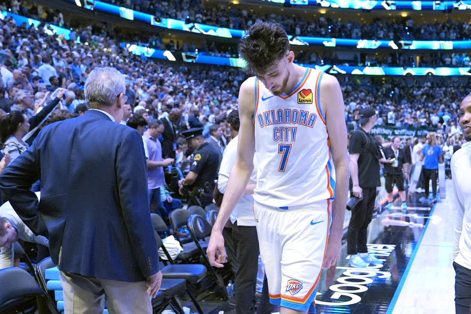 Oklahoma City Thunder forward Chet Holmgren walks off the court after Game 6 of an NBA basketball second-round playoff series against the Dallas Mavericks Saturday, May 18, 2024, in Dallas. (AP Photo/Tony Gutierrez)