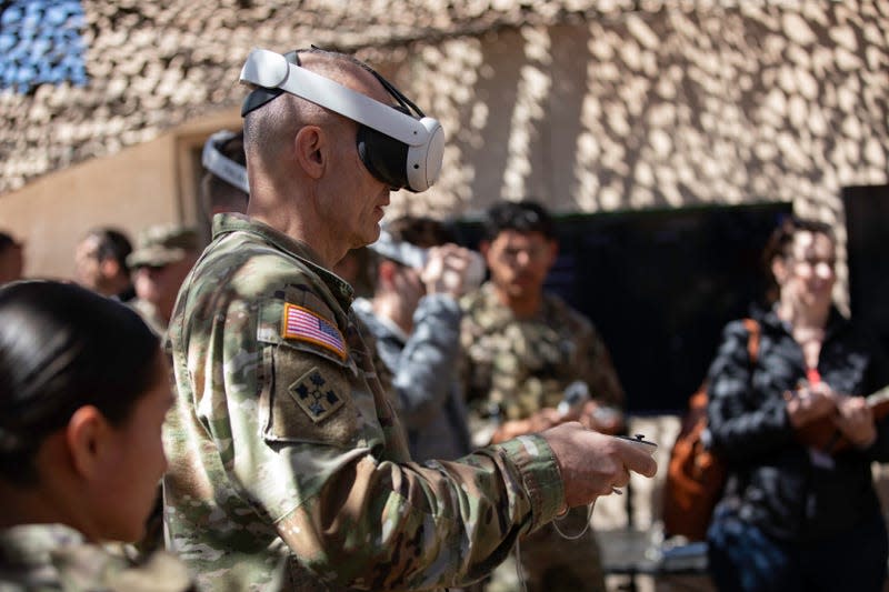 Gen. Randy George, Chief of Staff of the Army, tests new augmented reality technology during a series of human machine integration experiments as part of Project Convergence – Capstone 4 at Fort Irwin, Calif., March 18, 2024. - Photo: U.S. Army photo by Sgt. Maxwell Bass