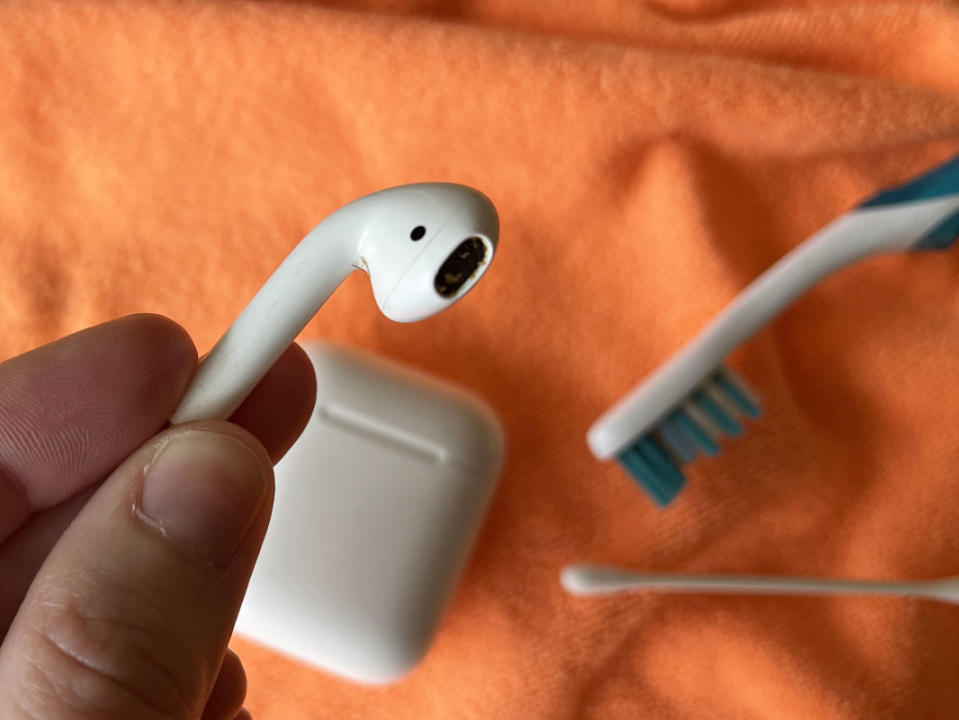 Clean the plastic surround, mesh screen, and (if applicable) the silicone tip of your AirPods.<p>Emily Fazio</p>