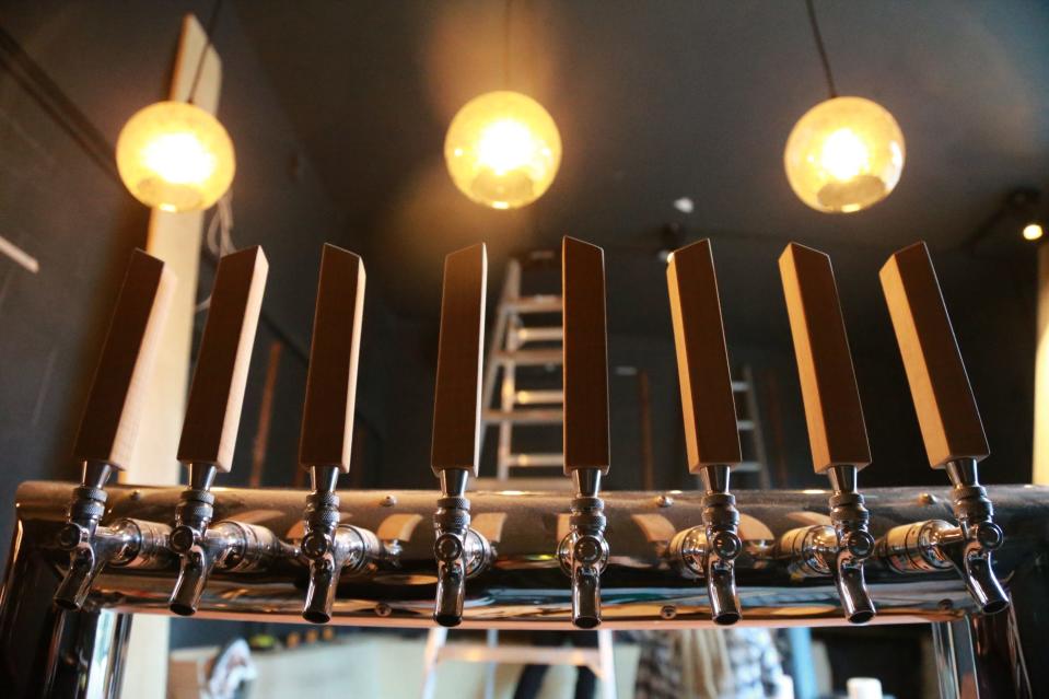Taps in place at the bar inside Smol, which opened in March 2022 at Two Tides Brewing.