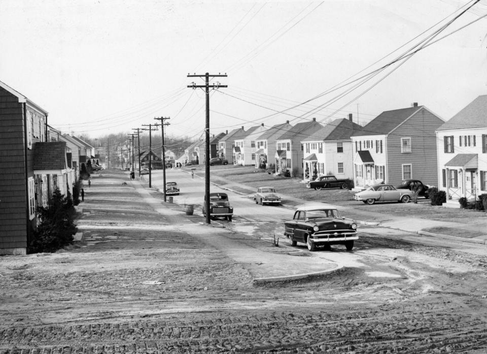 The duplexes on Uncatena Avenue are shown in February 1954, after they were rebuilt following a powerful tornado a year earlier.