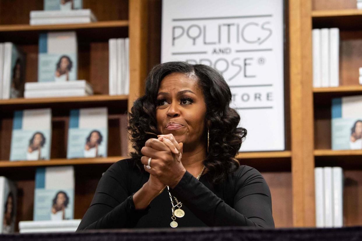 Former First Lady Michelle Obama said she had been feeling 'out of body, out of mind': AFP via Getty Images