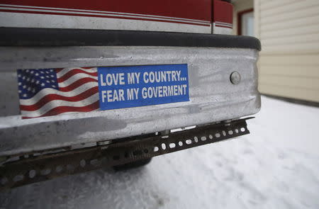 A bumper sticker on a private truck is seen in front of a residential building at the Malheur National Wildlife Refuge near Burns, Oregon, January 5, 2016. REUTERS/Jim Urquhart