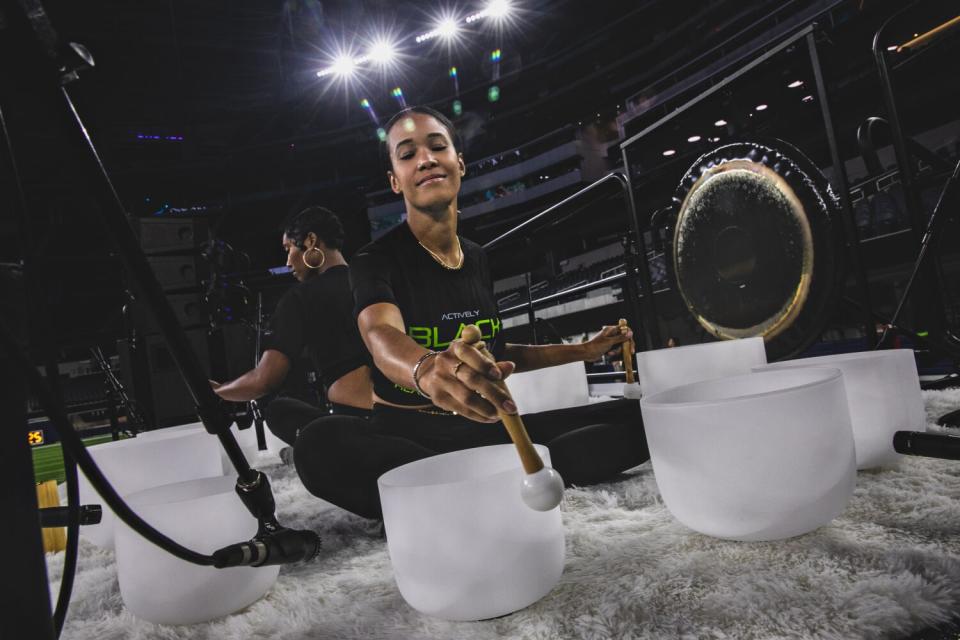 Sound bath healers play their bowls at Actively Black's Mental Wellness Training Camp for Black men