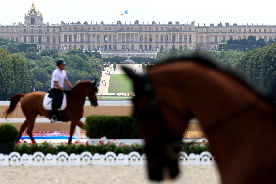 PARIS, FRANCE - JULY 25: A general view of the Chateau de Versailles as horses and riders practice dressage during an Equestrian Eventing training session ahead of the Paris 2024 Olympics Games at Chateau de Versailles on July 25, 2024 in Versailles, France. (Photo by Mike Hewitt/Getty Images)