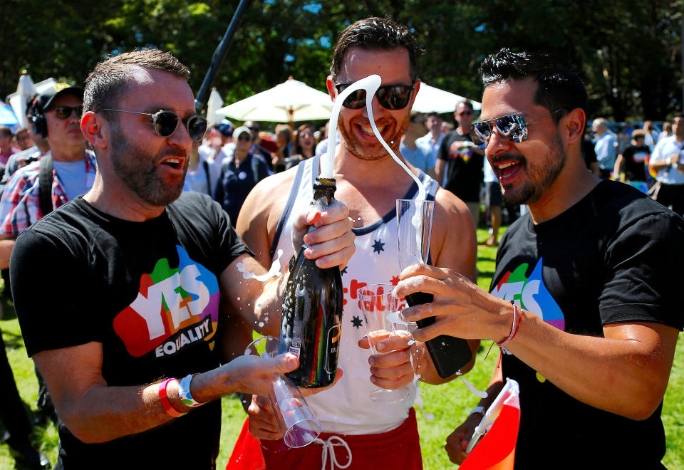 <p>Supporters of the ‘Yes’ vote for marriage equality celebrate after it was announced the majority of Australians support same-sex marriage in a national survey, paving the way for legislation to make the country the 26th nation to formalise the unions by the end of the year, at a rally in central Sydney, Australia, Nov. 15, 2017. (Photo: David Gray/Reuters) </p>