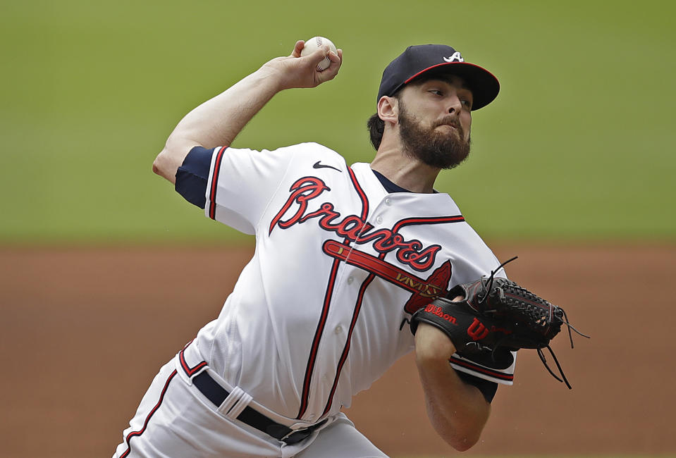 Atlanta Braves pitcher Ian Anderson works against the Washington Nationals in the first inning of a baseball game Sunday, July 10, 2022, in Atlanta. (AP Photo/Ben Margot)