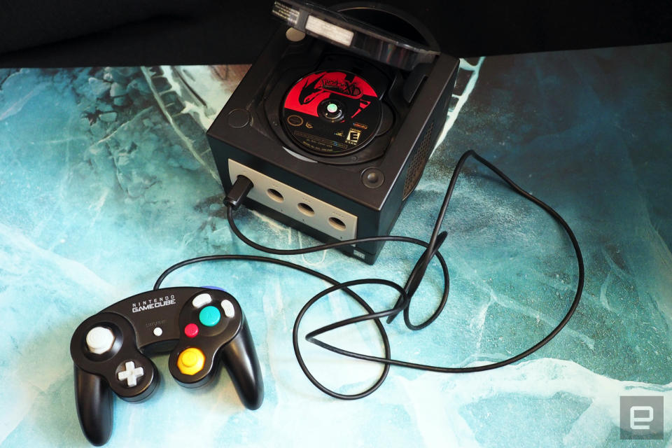 <p>Nintendo GameCube, black version with controller and games</p> 