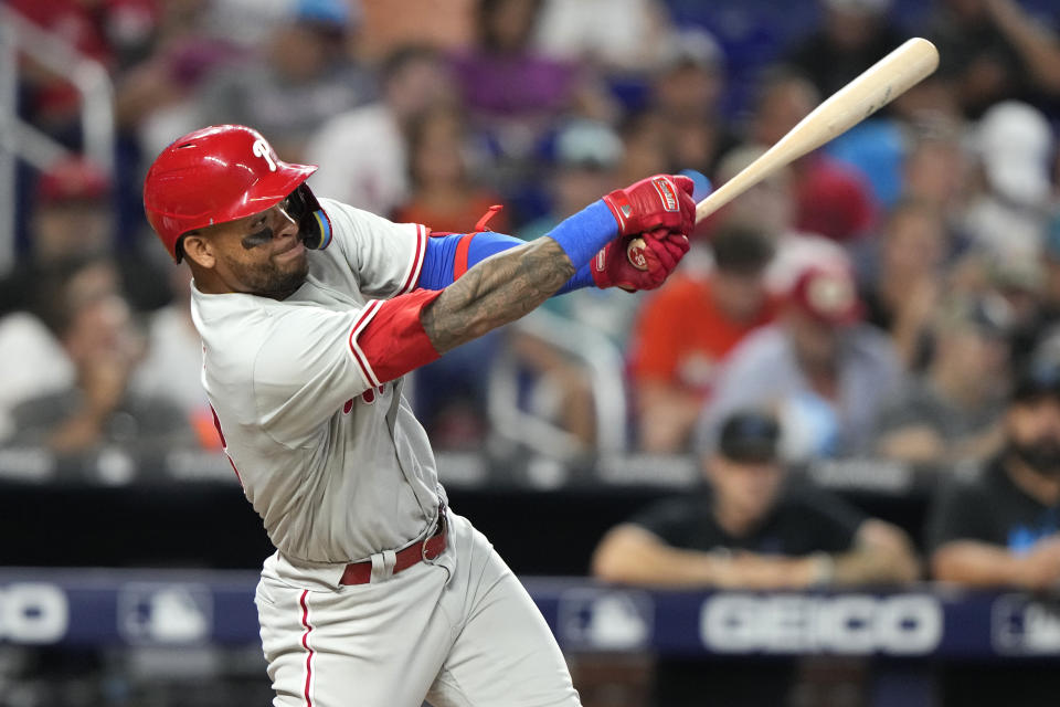 Philadelphia Phillies' Edmundo Sosa hits a two-run home run during the fifth inning of a baseball game against the Miami Marlins, Sunday, July 9, 2023, in Miami. (AP Photo/Lynne Sladky)