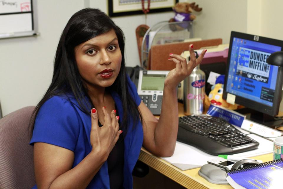 A closeup of Mindy's character Kelly at a computer