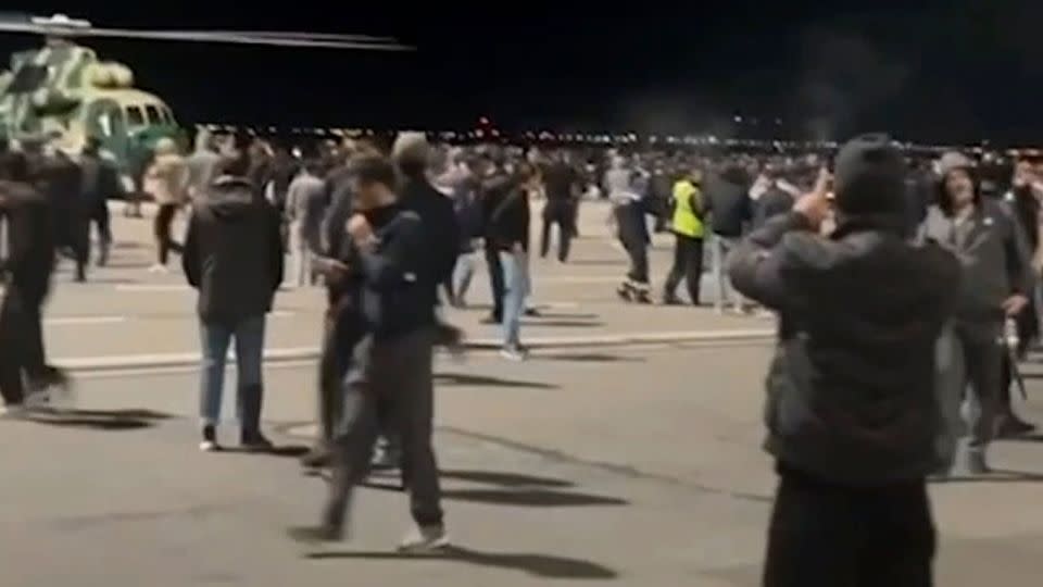 Crowds storm the tarmac at Makhachkala Uytash Airport (MCX) in the southern Russian Republic of Dagestan on Sunday, following the arrival of a flight from Tel Aviv. - From Telegram