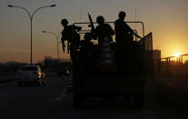 <p>Brazilian soldiers set up a checkpoint along a major road on the first day of a massive security operation that they say will last through the end of the Rio 2016 Olympic Games, in Rio de Janeiro, Brazil, July 24, 2016. (Photo: Ricardo Moraes/REUTERS)</p>