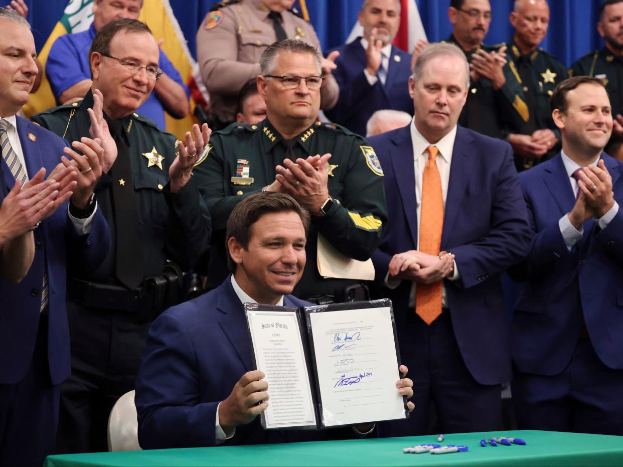 Ron DeSantis holds a news conference at the Polk County Sheriff’s Office in Winter Haven, Florida on Monday, April 19, 2021.  (AP)