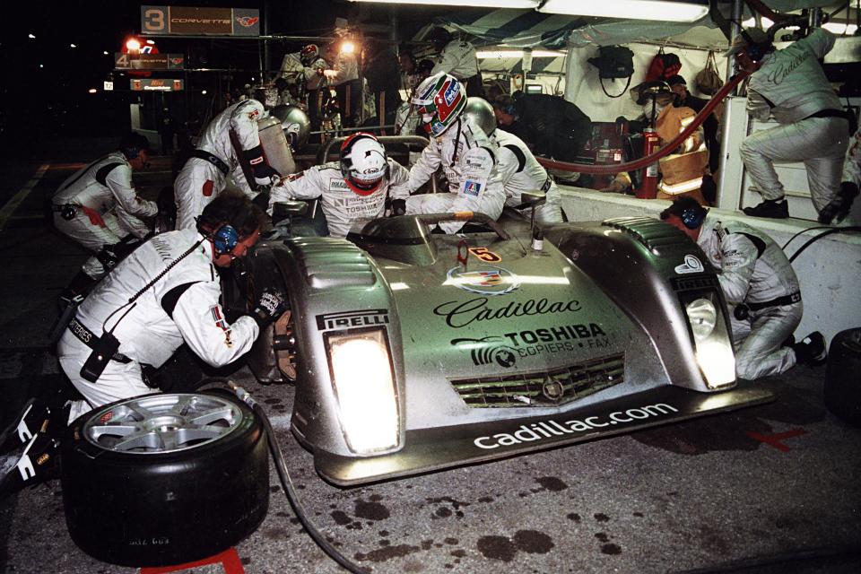 DAYTONA BEACH, FL — February 5-6, 2000: The Cadillac Northstar LMP of Massamiliano Angelelli, Wayne Taylor and Eric van de Poele makes a nighttime pit stop at Daytona International Speedway during the Rolex 24 at Daytona. The team would go on to finish 14th overall in the race. (Photo by ISC Images & Archives via Getty Images)