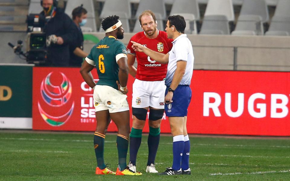 Referee Ben O'Keefe (right) speaks with Siya Kolisi and Alun Wyn Jones - PA