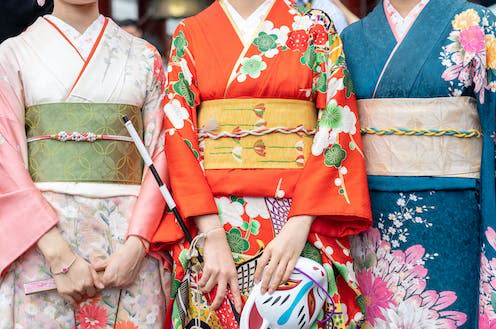 <span class="caption">Now a symbol of Japanese culture, the Kimono has Chinese roots. </span> <span class="attribution"><a class="link " href="https://www.shutterstock.com/image-photo/young-girl-wearing-japanese-kimono-standing-1393043549" rel="nofollow noopener" target="_blank" data-ylk="slk:supawat bursuk/Shutterstock;elm:context_link;itc:0;sec:content-canvas">supawat bursuk/Shutterstock</a></span>