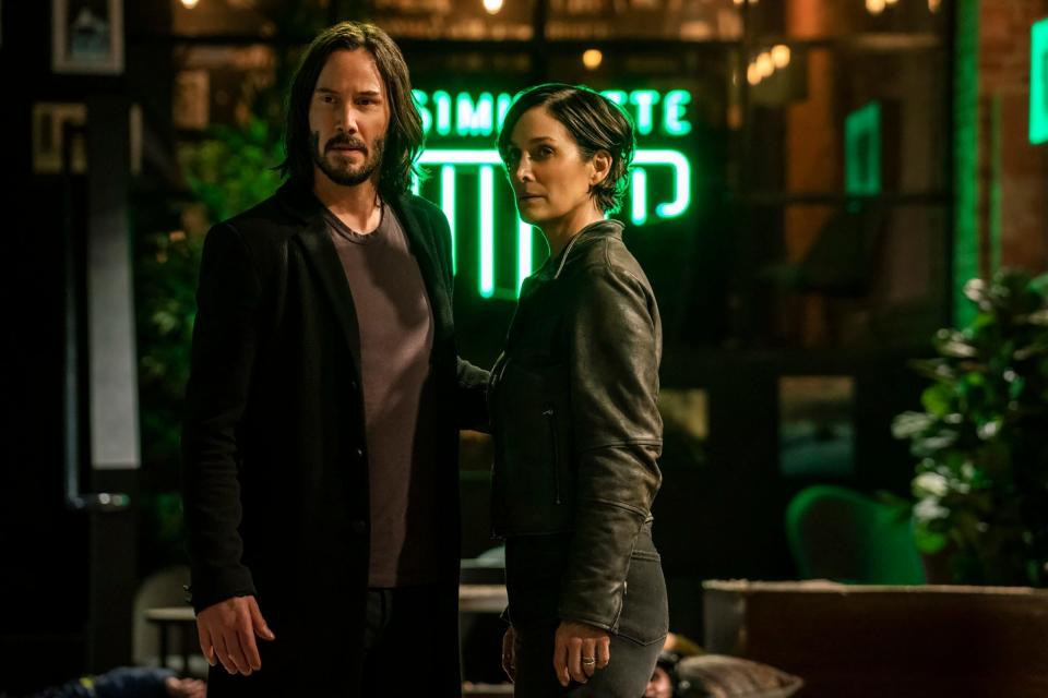 Neo (Keanu Reeves) and Trinity (Carrie-Anne Moss) in "The Matrix Resurrections." A fifth film in the series has been announced by Warner Bros.
