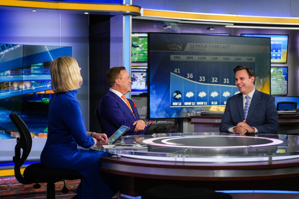 Former KCCI chief meteorologist Chris Gloninger, right, with former nightly news anchor Steve Karlin and anchor Stacey Horst in the studio in March.