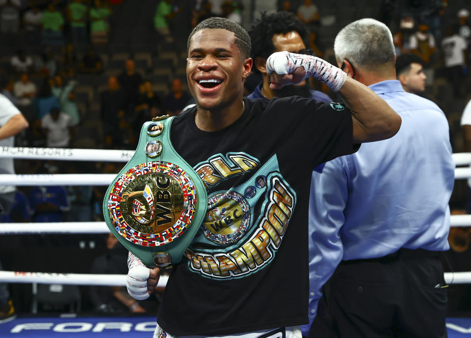 Devin Haney celebrates after defeating Jorge Linares by unanimous decision in the WBC lightweight title boxing match on Saturday, May 29, 2021, in Las Vegas. (AP Photo/Chase Stevens)