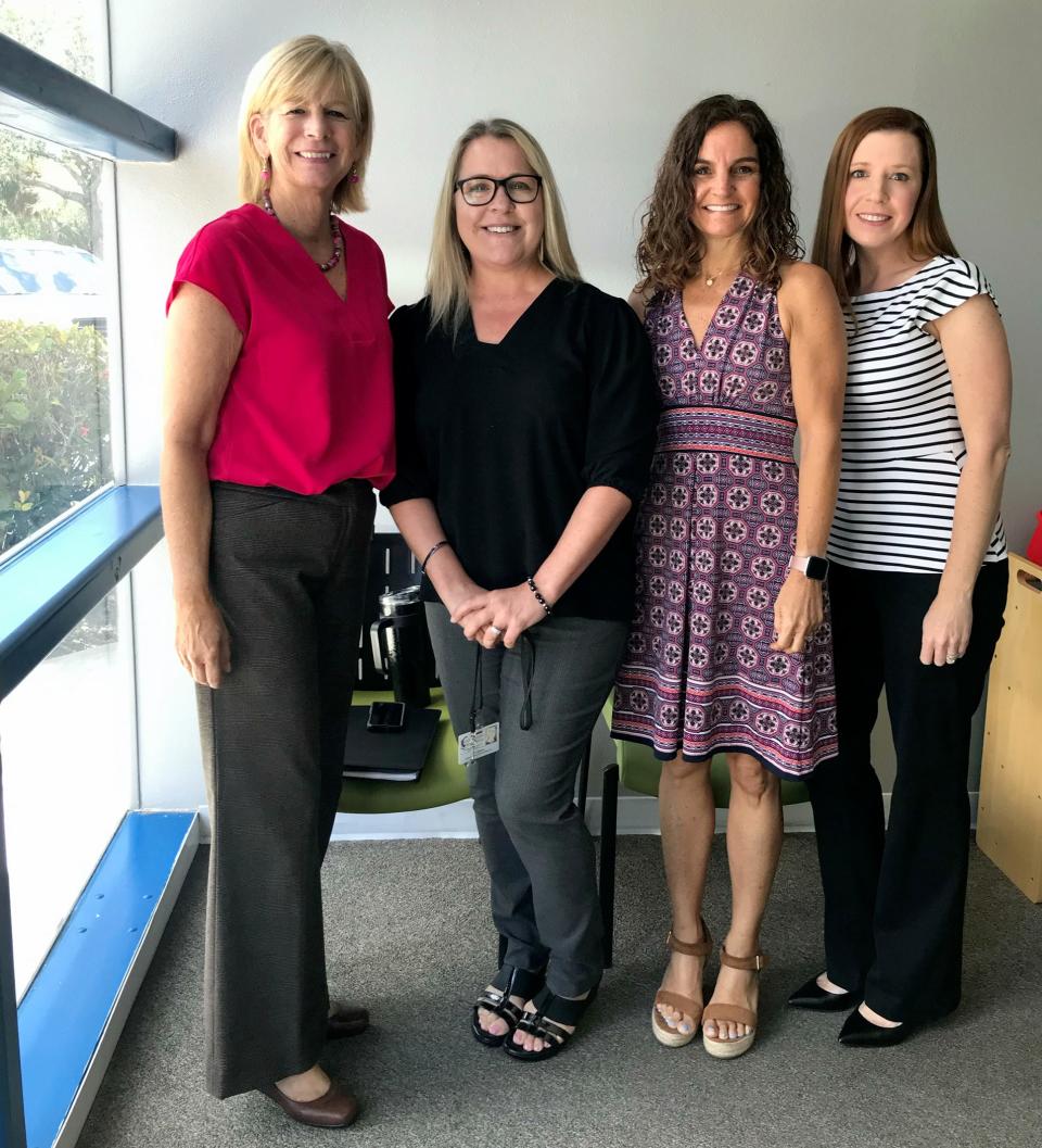 Safe Children Coalition employees Robin Jensen, left, Jill Steiner, Tonia Hutchinson and Stacey Schaeffer were recently promoted.