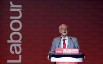 Labour leader Jeremy Corbyn speaks at Labour's National Women's Conference at the ACC, ahead of the party's annual conference, in Liverpool, England, Saturday Sept. 22, 2018. (Peter Byrne/PA via AP)