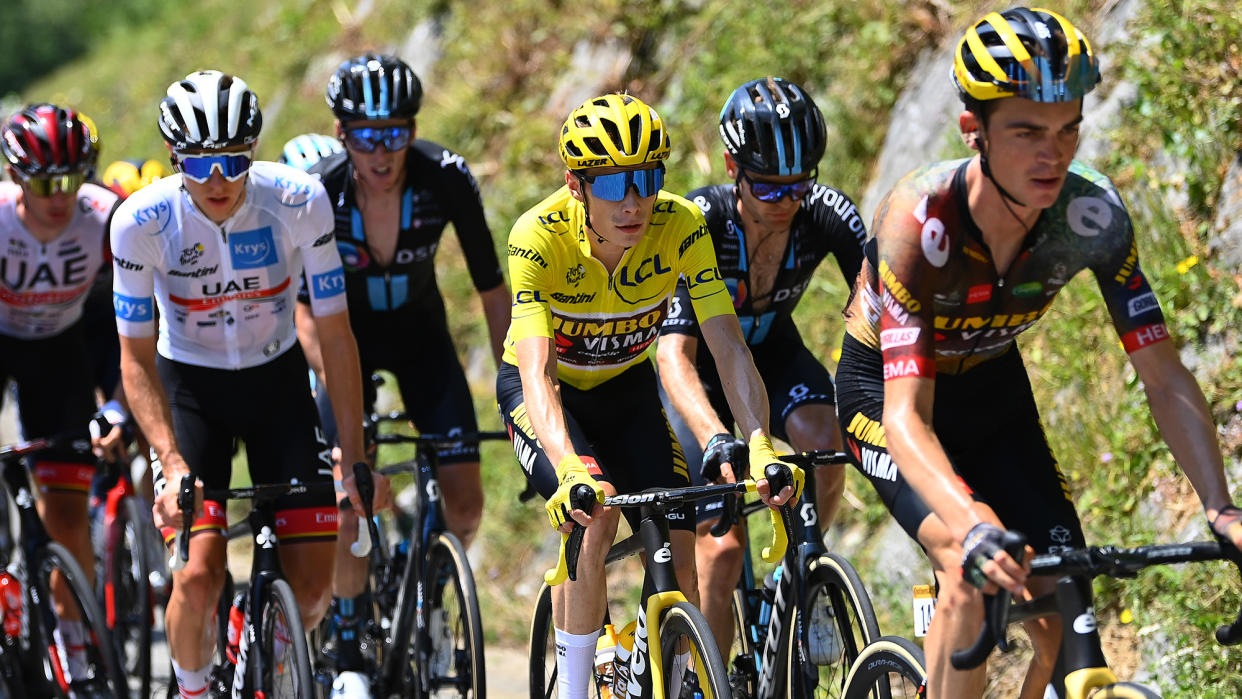  (L-R) Tadej Pogacar of Slovenia and UAE Team Emirates - White Best Young Rider Jersey, Jonas Vingegaard Rasmussen of Denmark and Team Jumbo - Visma - Yellow Leader Jersey and Chris Hamilton of Australia and Team DSM compete during the Tour de France live stream 